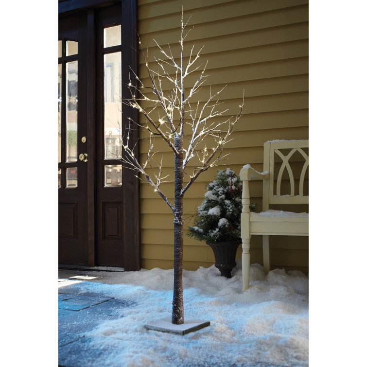 The Seasonal Aisle Snow Effect Spruce Artificial Christmas Tree with